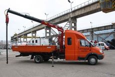 «Дорожный мастер» с двухрядной 7-местной кабиной и КМУ Amco Veba с буром «Дорожный мастер» с двухрядной 7-местной кабиной и КМУ Amco Veba с буром